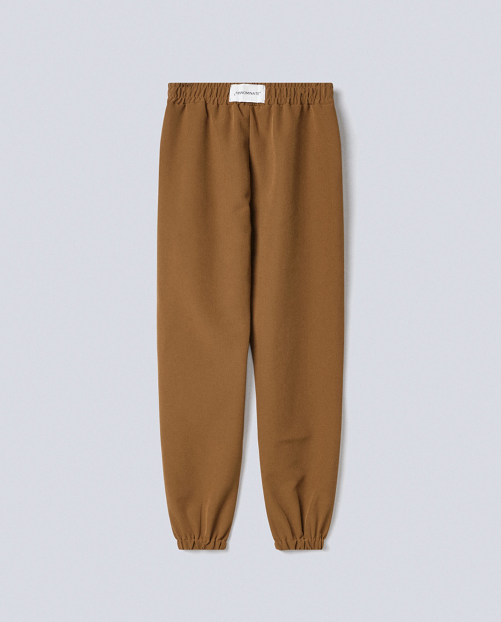 PANTALONE IN TESSUTO TECNICO CON ETICHETTA SUL RETRO
