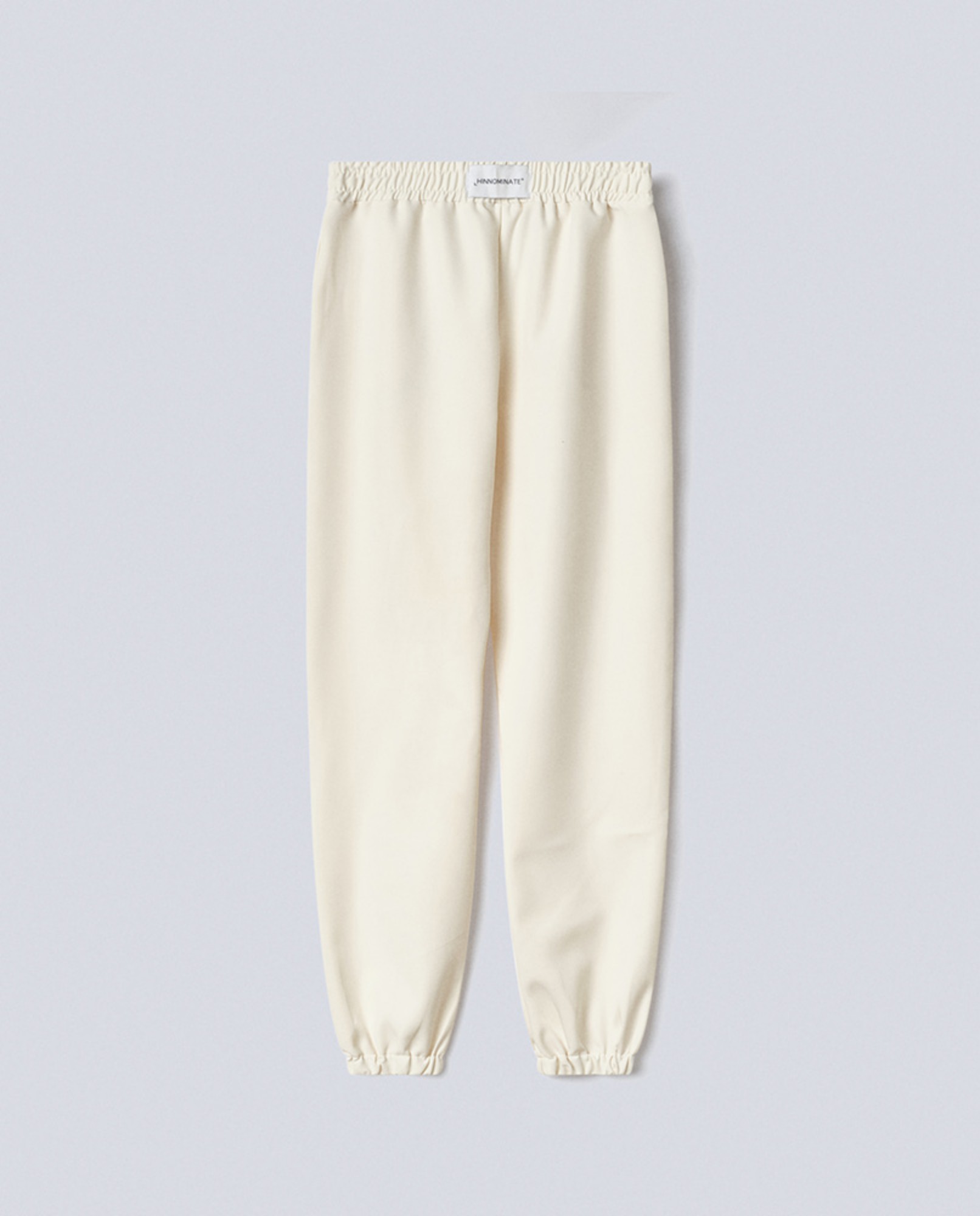 PANTALONE IN TESSUTO TECNICO CON ETICHETTA SUL RETRO