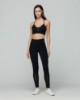 Leggings fitness con inserti in tulle laterali • Nero