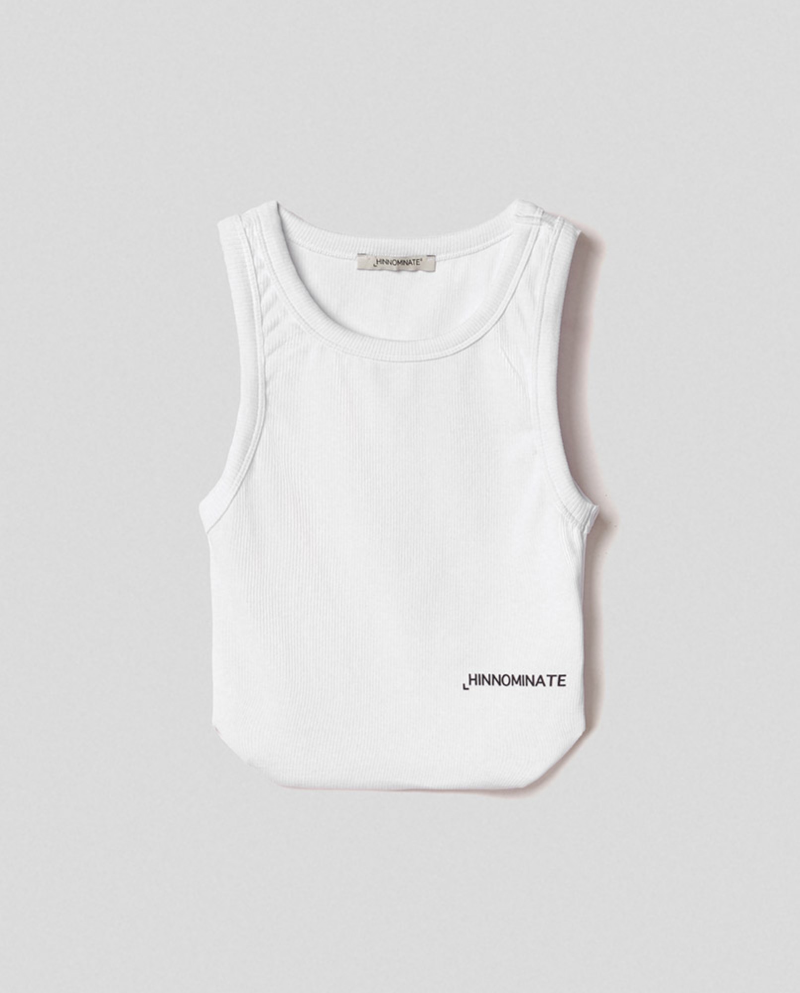 Crop top in costina con fondo stondato • Bianco
