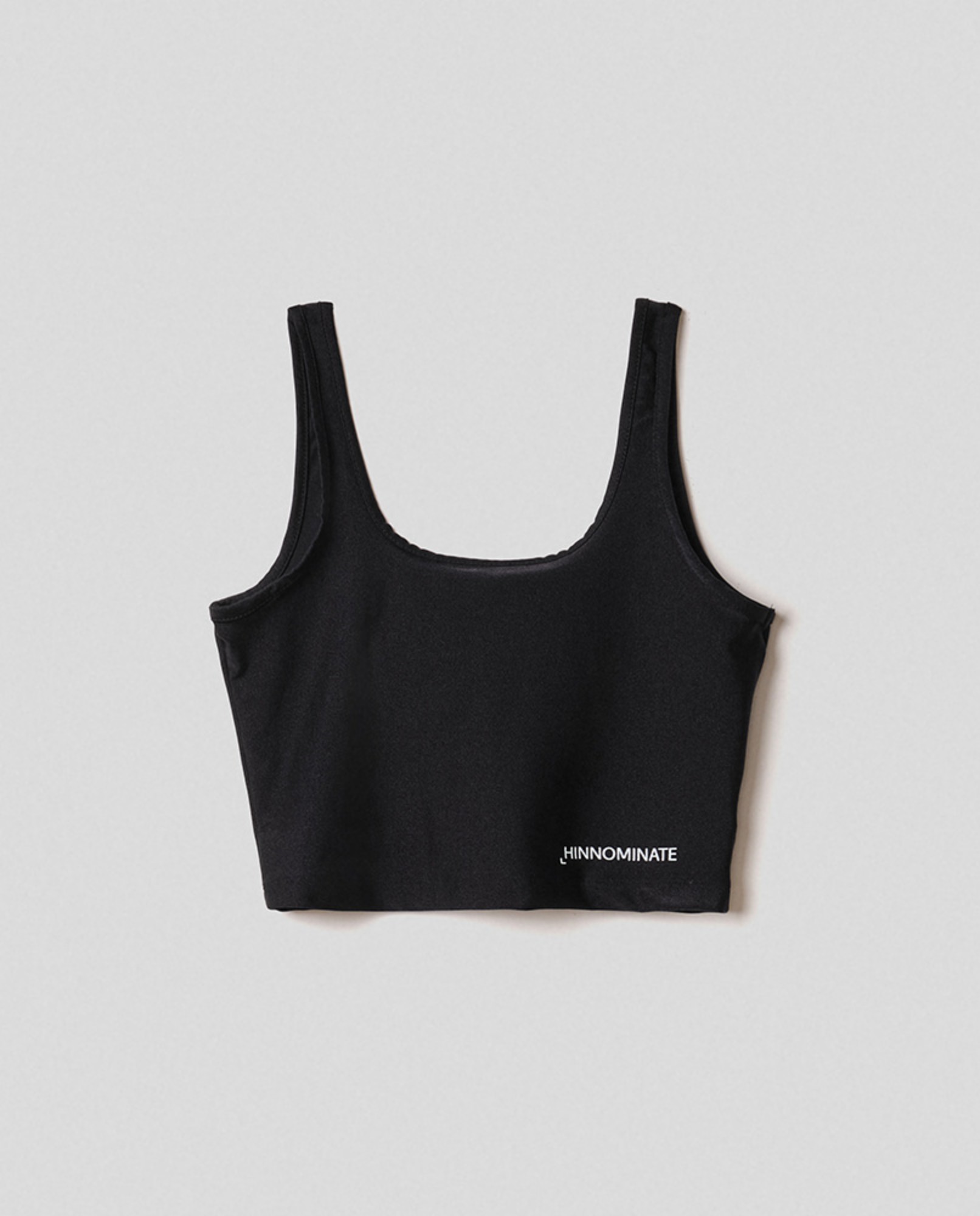 Top in lycra lucida con cucitura sotto al seno crop • Nero