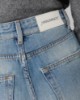 Jeans A Vita Media Con Gamba Morbida E Strappi • Blue Wash