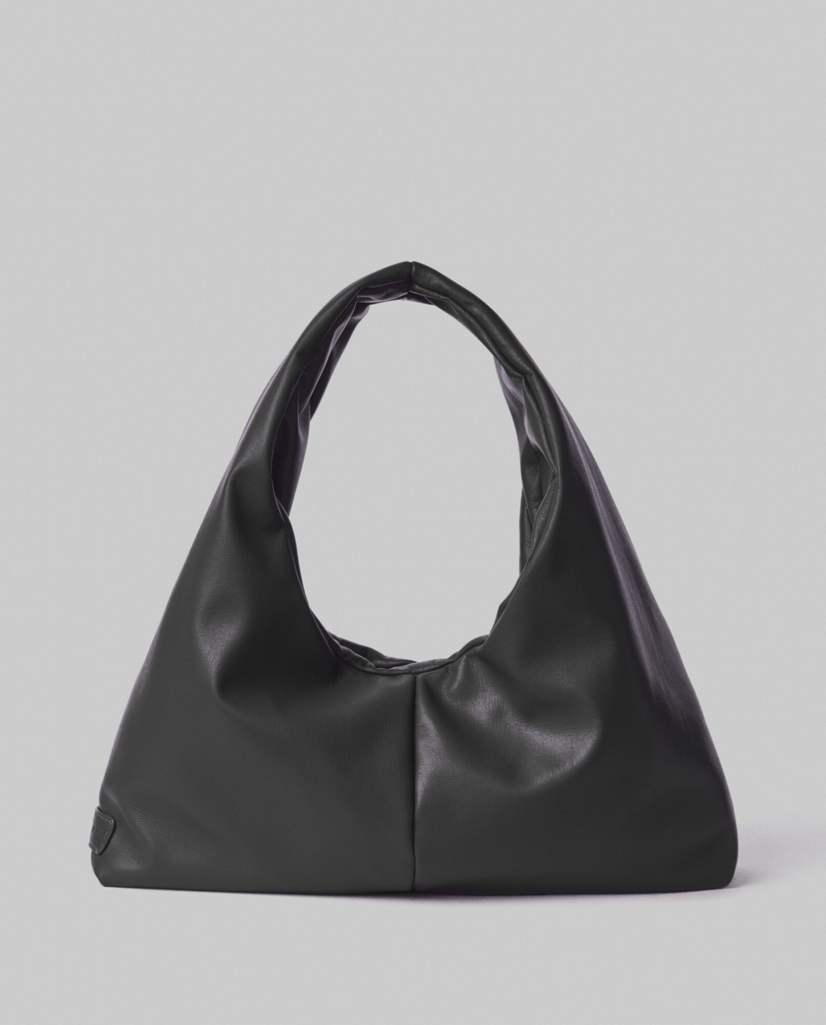 Picture of Medium Faux Leather Bag with Metal Label and Plate • Black