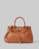 Picture of Medium Faux Leather Bag with Metal Plate • Leather