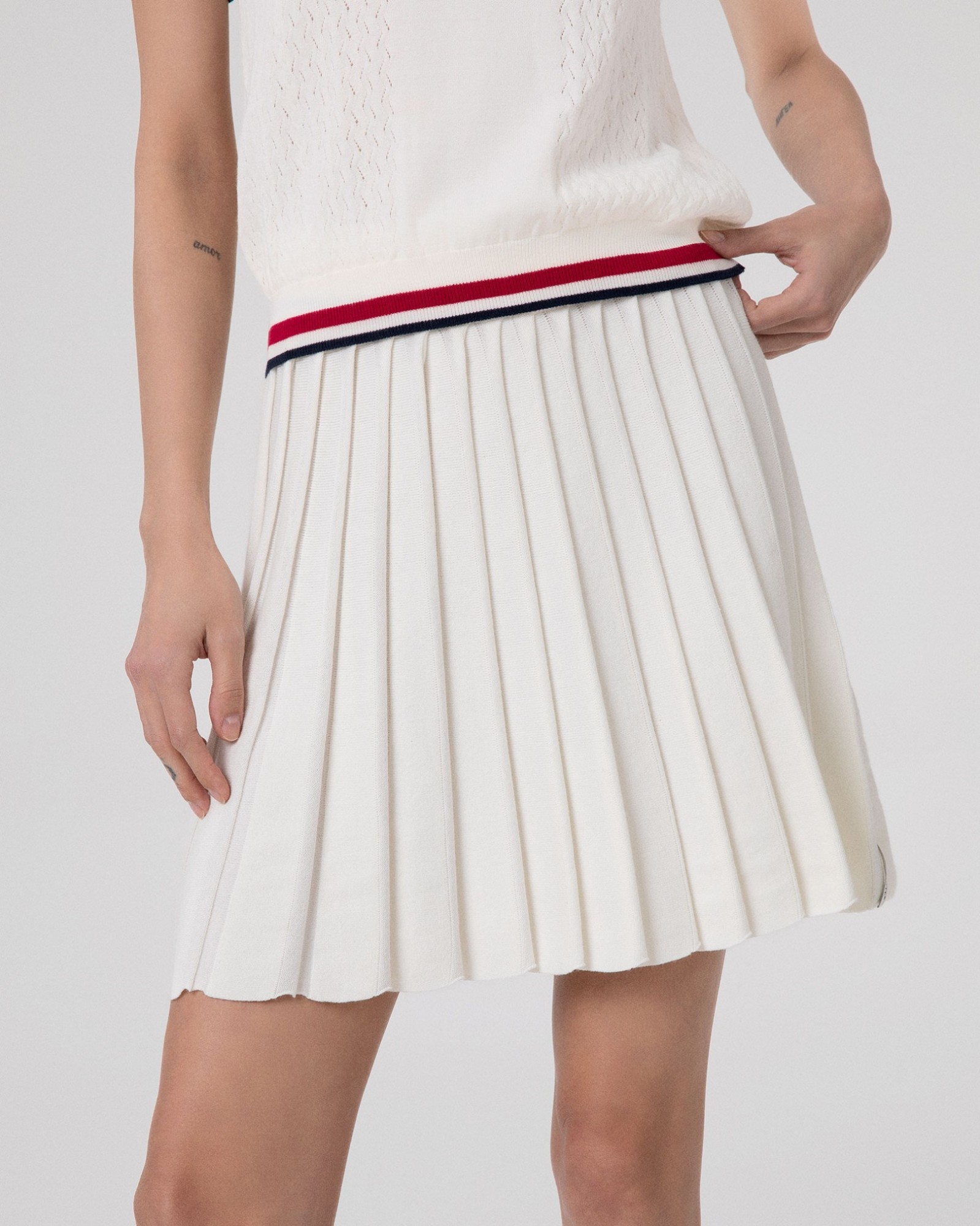 Minigonna A Pieghe In Maglia Con Cinto Smacchinato • Off White