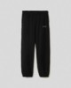 Picture of Oversized fleece trousers with elasticated hem • Black